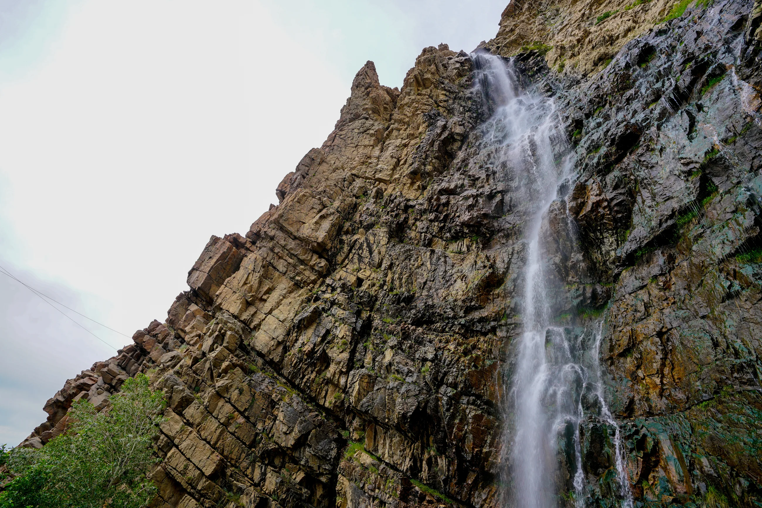 Waterfall cascading down a rocky mountain slope near Ogden